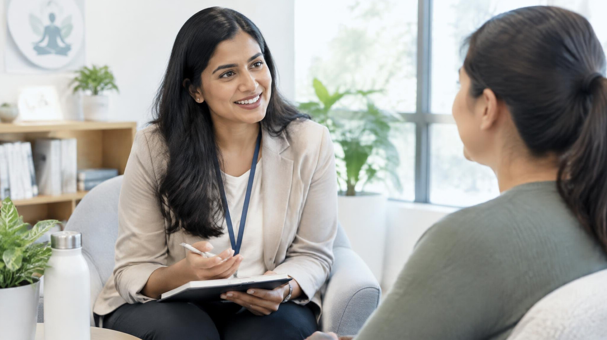 Wellness consultant talking with an employee